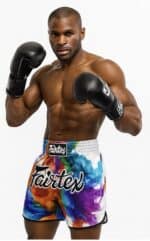 Boxer with black gloves, colorful shorts, and muscular build for Baba Saleh Sports Egypt.