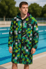 1. Boy in colorful sports jacket next to swimming pool, outdoor sportswear.